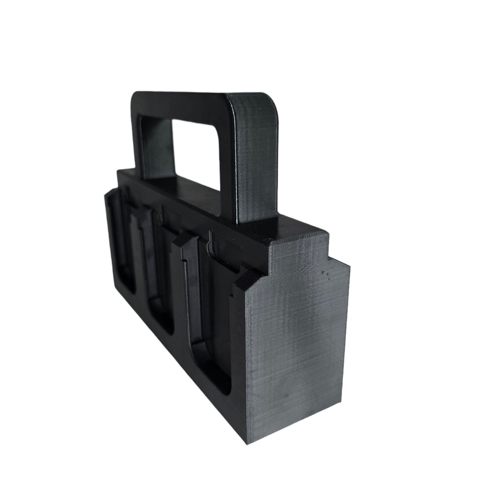 Introducing the Battery HEAVY DUTY 6X Battery Basket Carrier Caddy Holder for Makita: a sleek, black, 3D-printed design with a handle on top and six rectangular slots on the bottom to securely hold Makita batteries. The surface is smooth and features a matte finish.