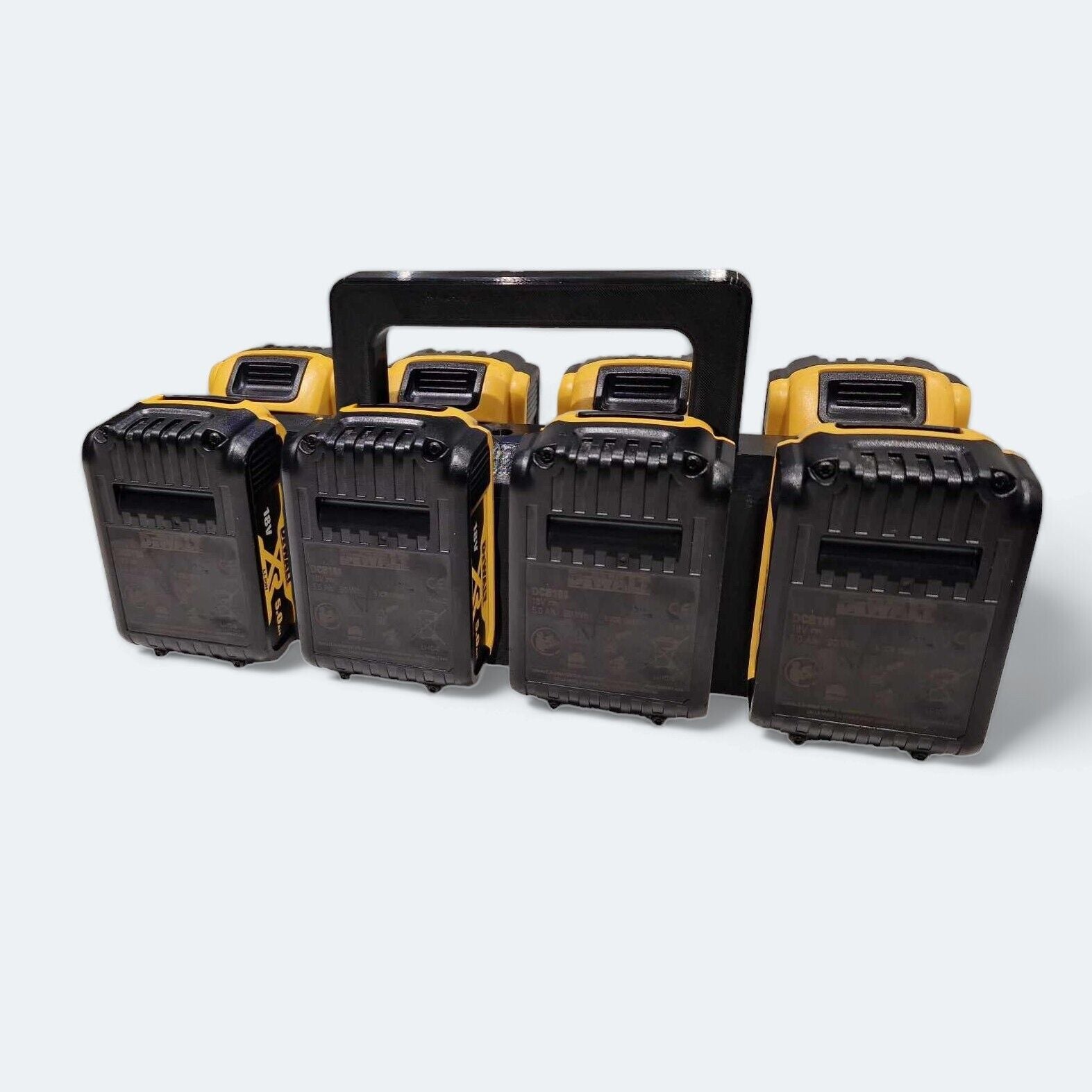 A set of four rectangular lithium-ion batteries, each showcasing distinct ridges and connectors on top, are neatly lined up side by side on a white background. They closely resemble the 8x Battery Basket Carrier Caddy Holder designed for DeWALT tools by Ice3Dprints.